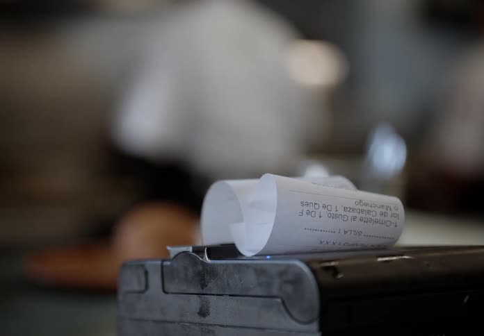 Order ticket printing from a thermal printer in the kitchen