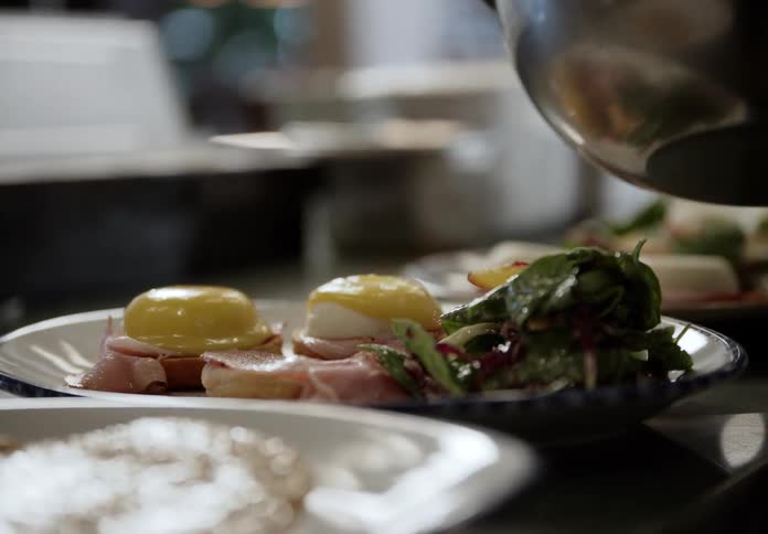 A person preparing food in a restaurant