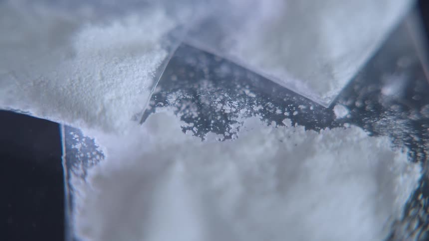 White powder is on the glass
