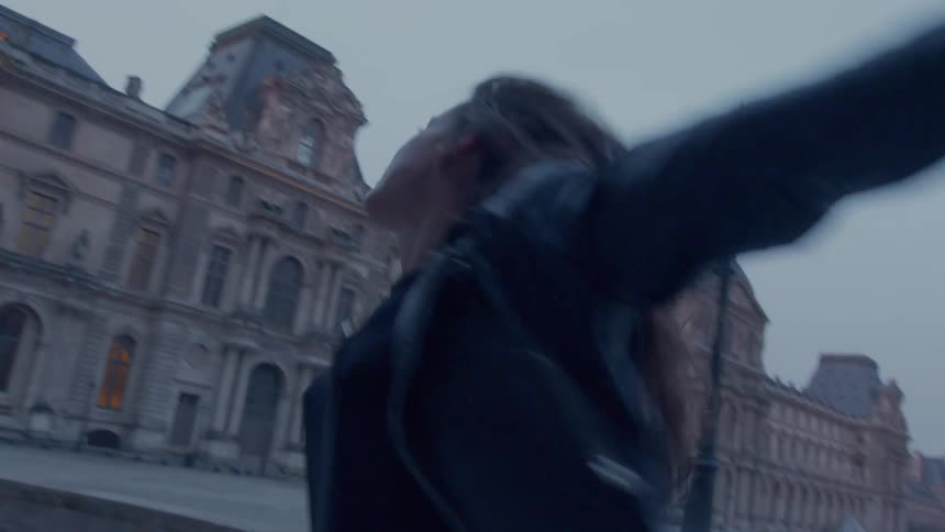 The man and woman run and dance together