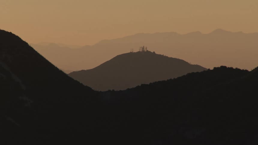 Mountains silhouetted by the atmosphere