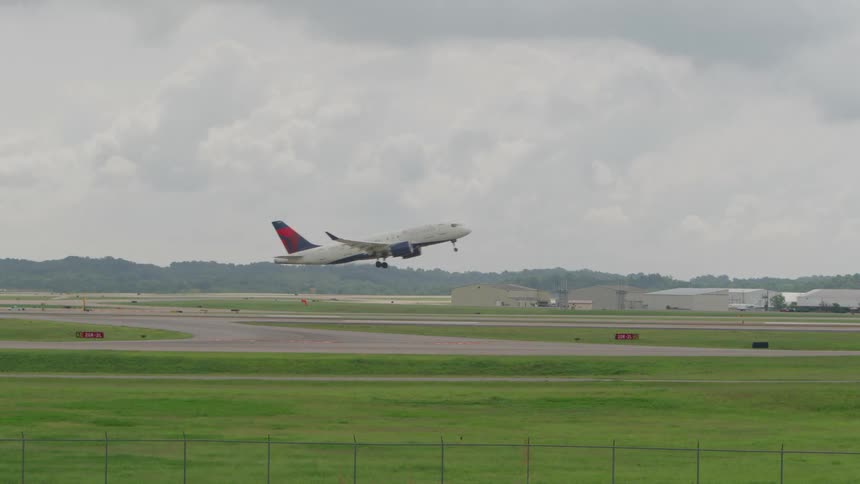 The airplane takes off on the runway