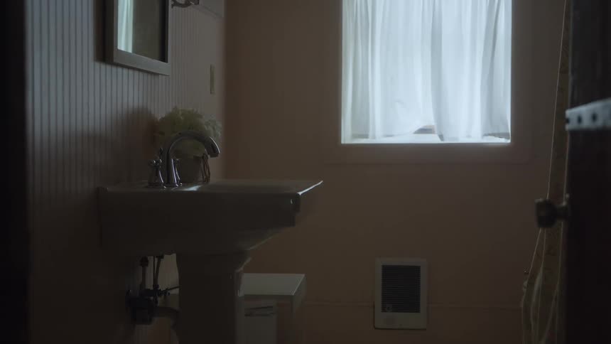 The inside of a bathroom in a house