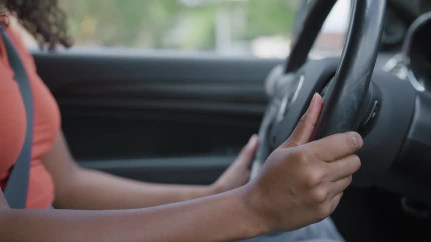 A woman driving a car