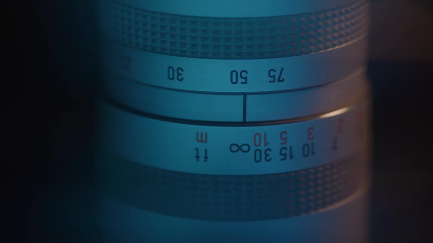 Focus ring shows distance markings in a cool blue closeup