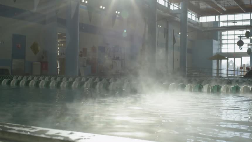 Steam rising up from a swimming pool
