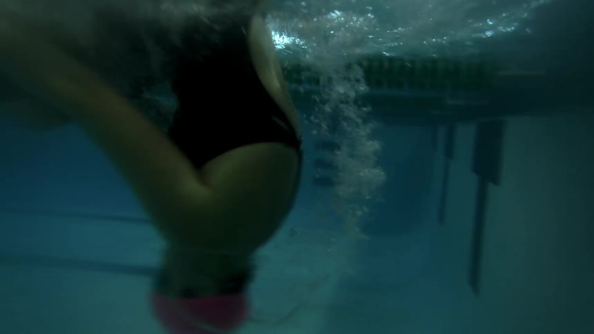 Woman swimming in a lap pool