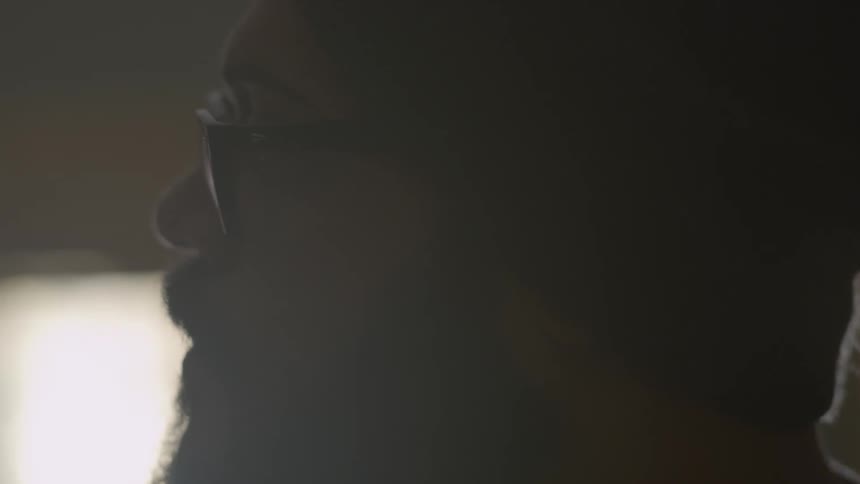 Close up of a bearded man's silhouette