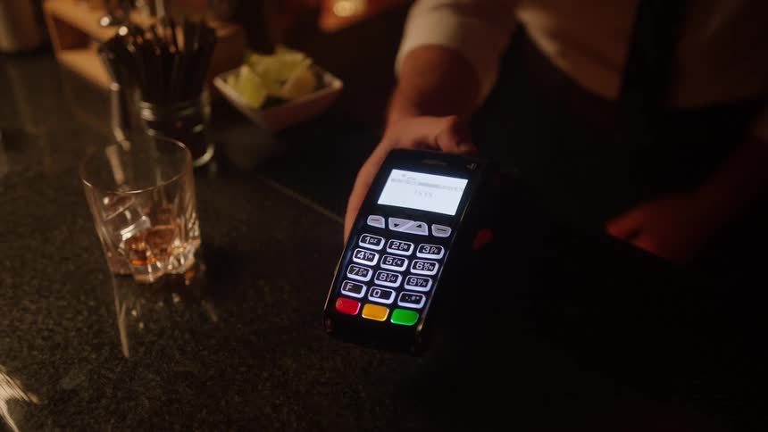 A person paying for things with a phone