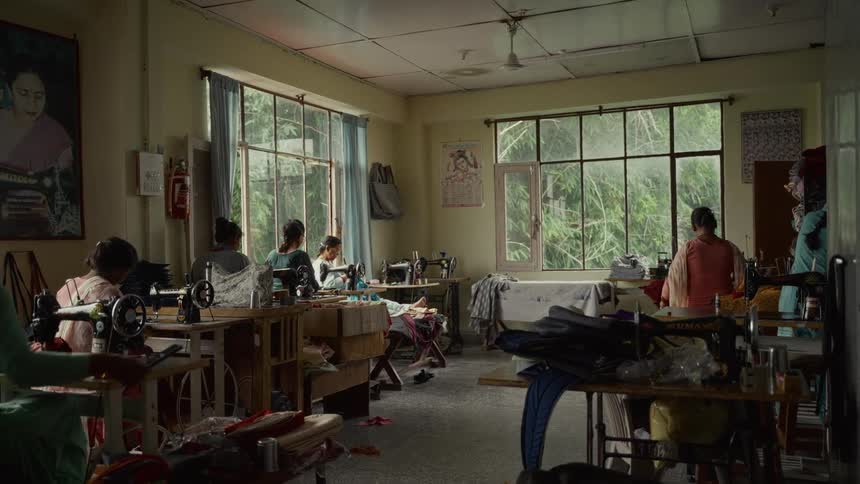Women in a room sewing