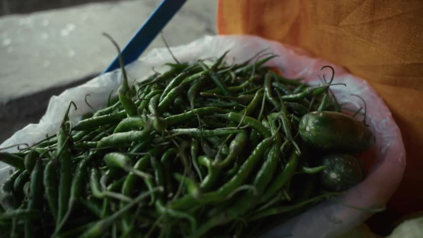A view of a bowl full of peppers