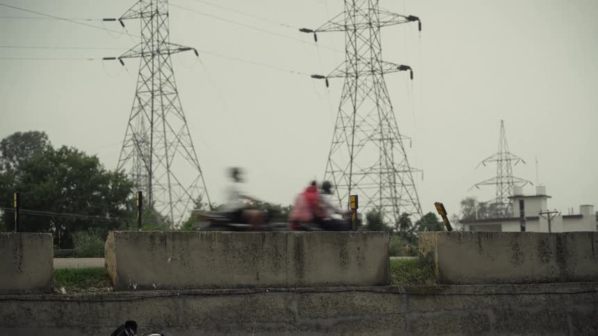 People riding motorcycles outdoors