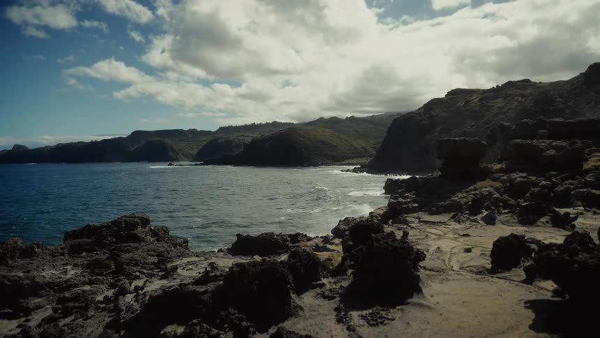 Waves crash along the coast