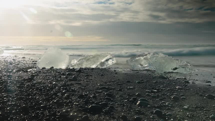 A view of water washing up on a shore