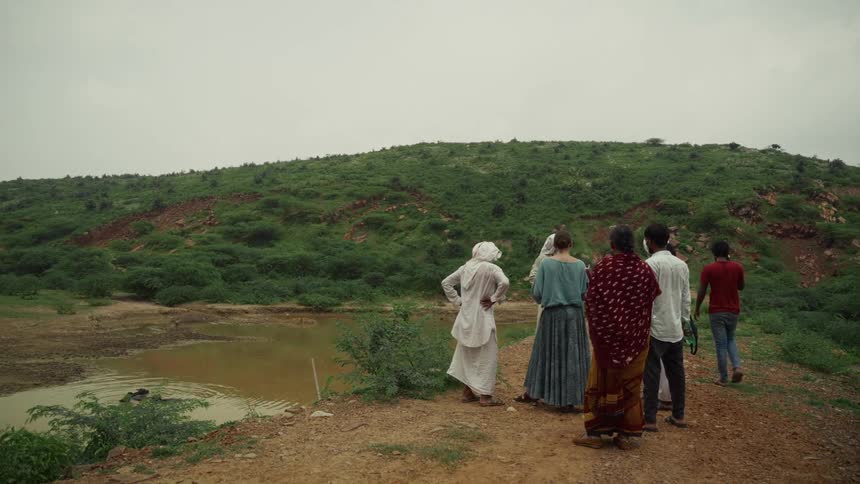 A group of women standing outdoors