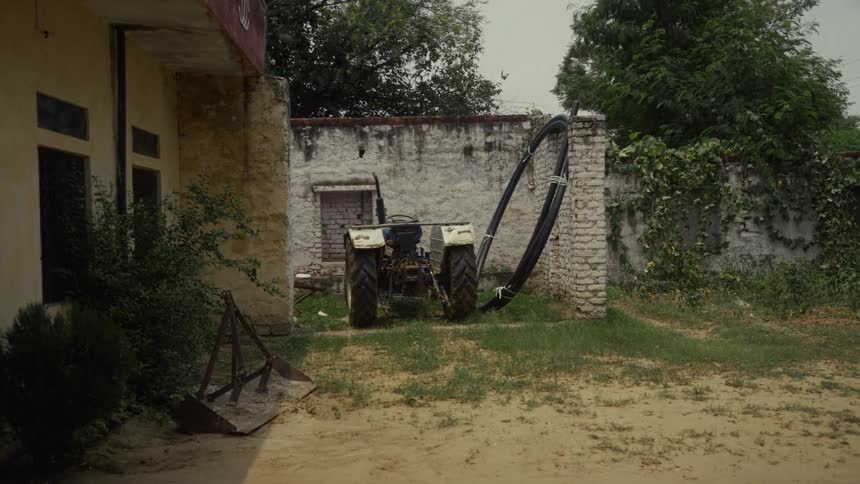 A view of a wall out on a house in a rural area