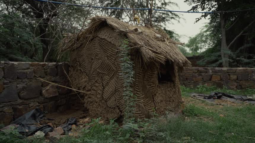 A hut outdoors on a sunny day
