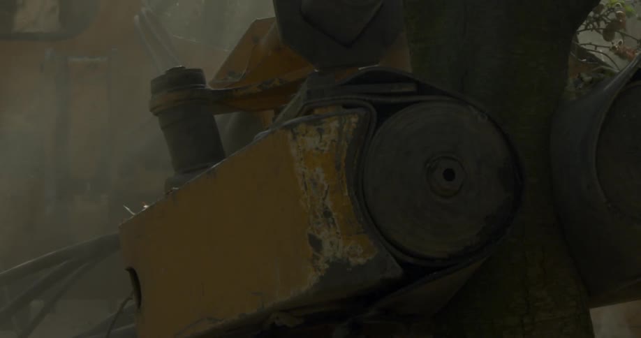 A closeup view of a piece of machinery blowing dust everywhere