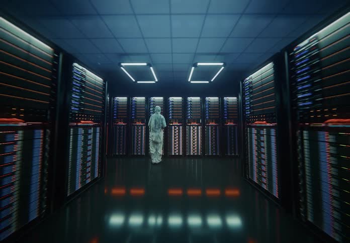 Person in protective suit facing illuminated servers in highsecurity tech environment in a data center