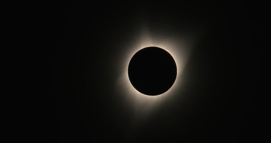 The sun is hidden by the moon's shadow during an eclipse