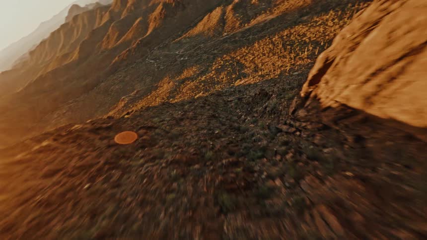 The mountain range has many dips and peaks
