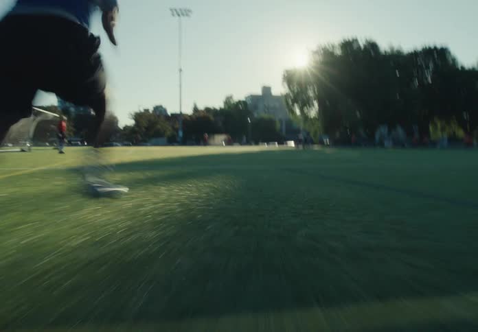 The man sprints across the field
