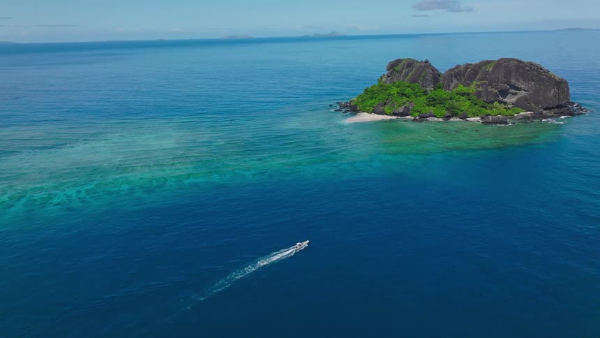 A view of an island out in the ocean