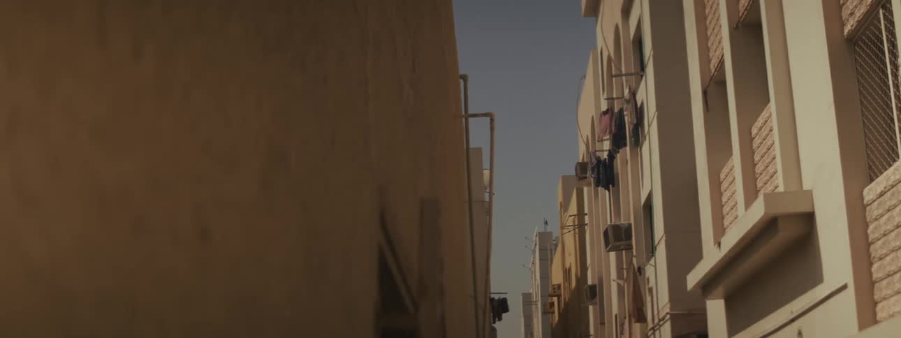 Sides of apartment buildings in a metropolitan city during daytime