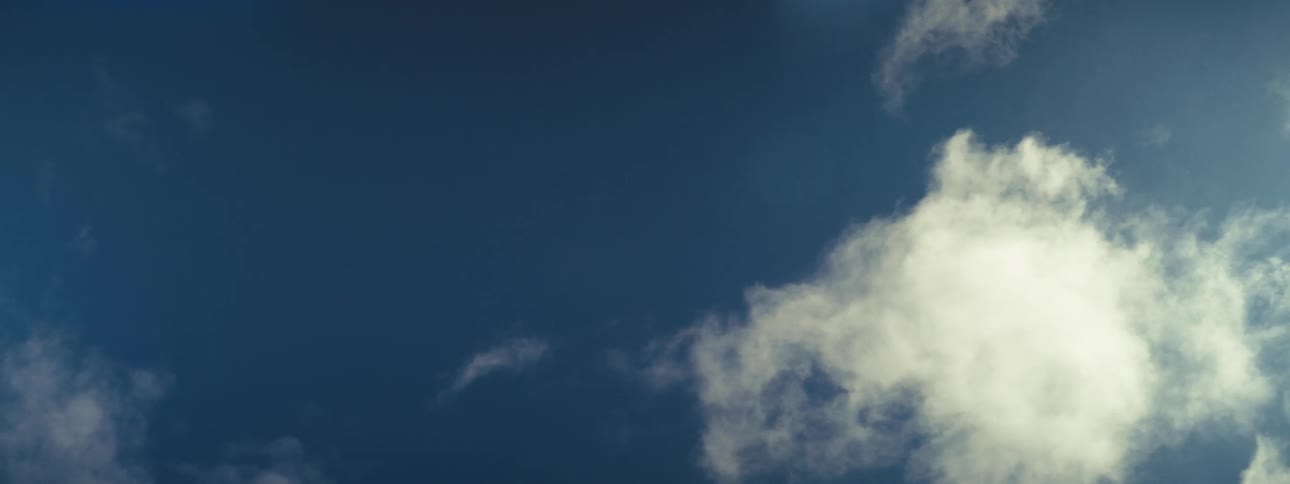 A cloudy blue sky at sunset