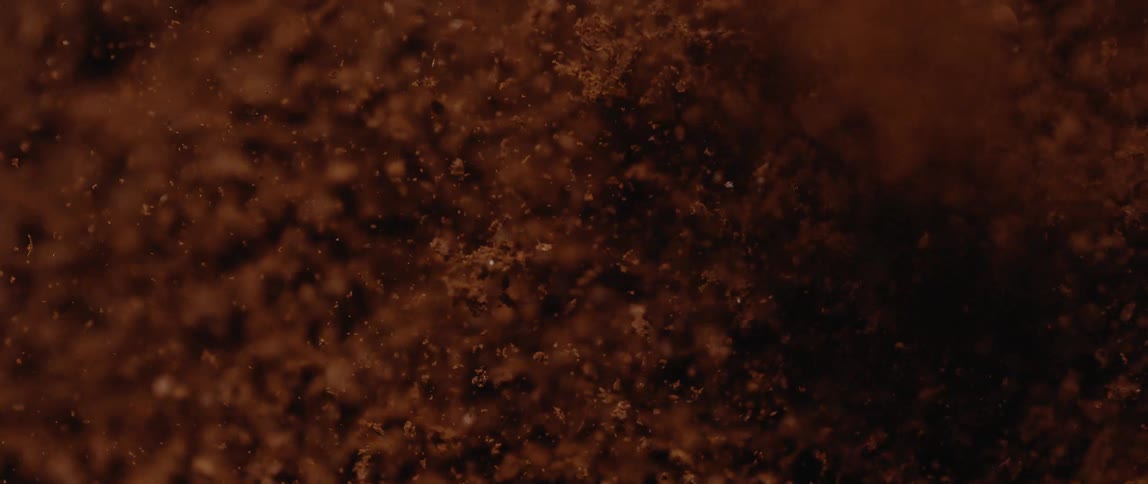 Red soil is pushing up and moving in water