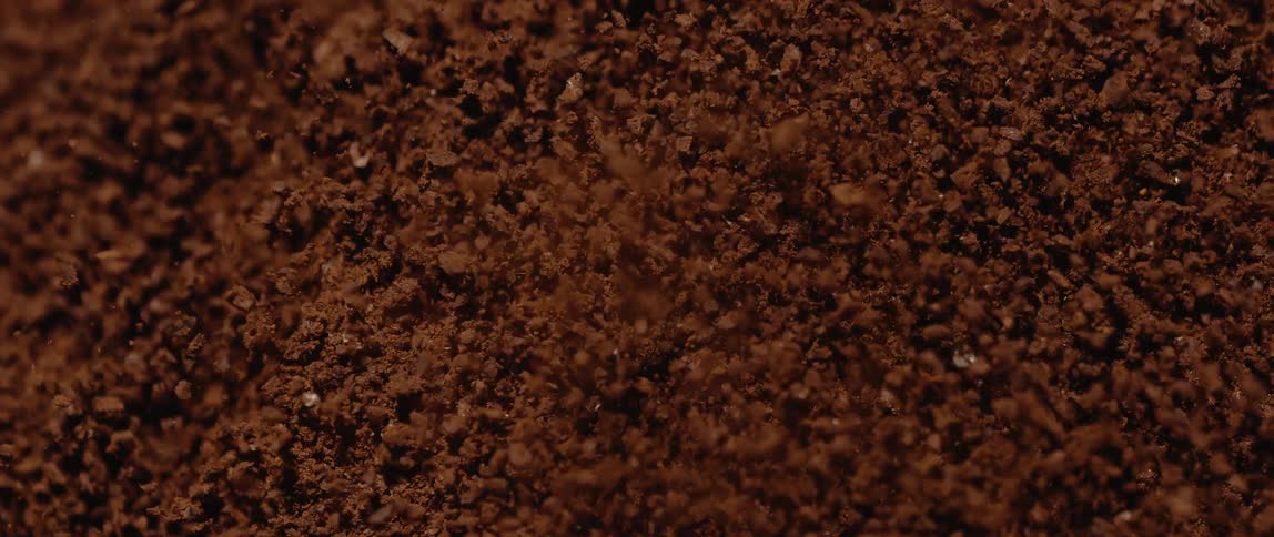 The coffee grounds vibrate and jump around