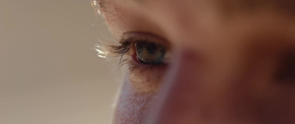 Closeup of a human eye lit by soft light