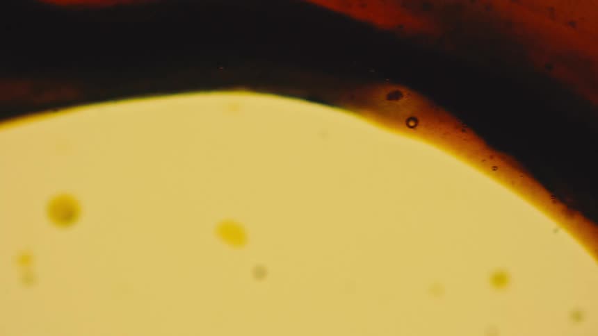 Yellow expands in a mixture pushing aside darker colors