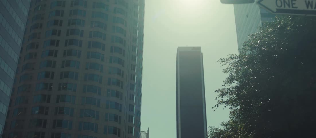 A view of some tall buildings in a city