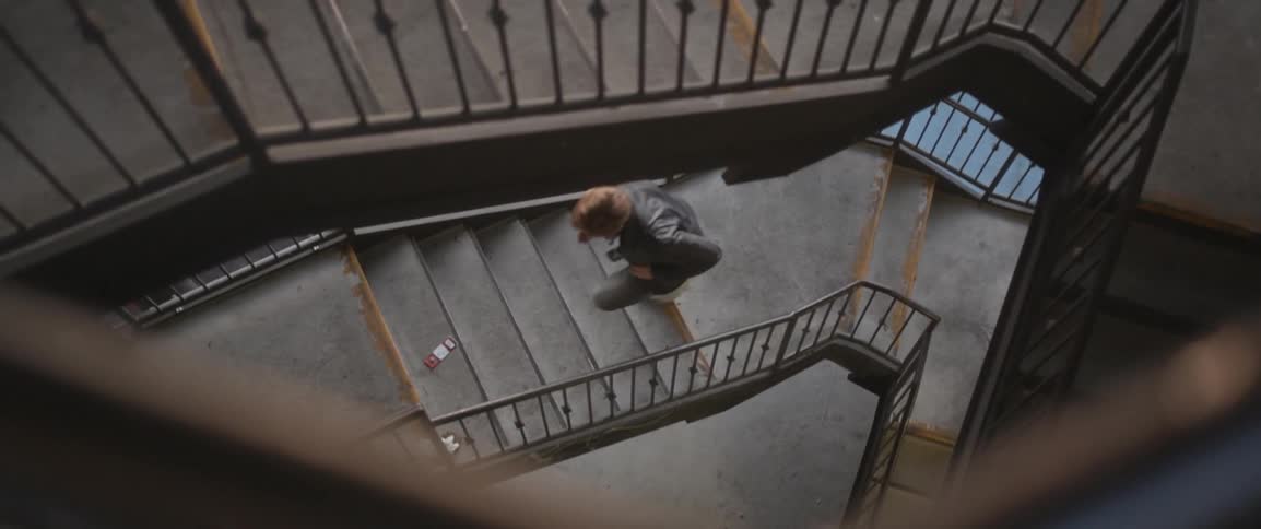 A person running up some stairs outside