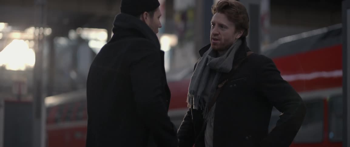 A man turns around in a station