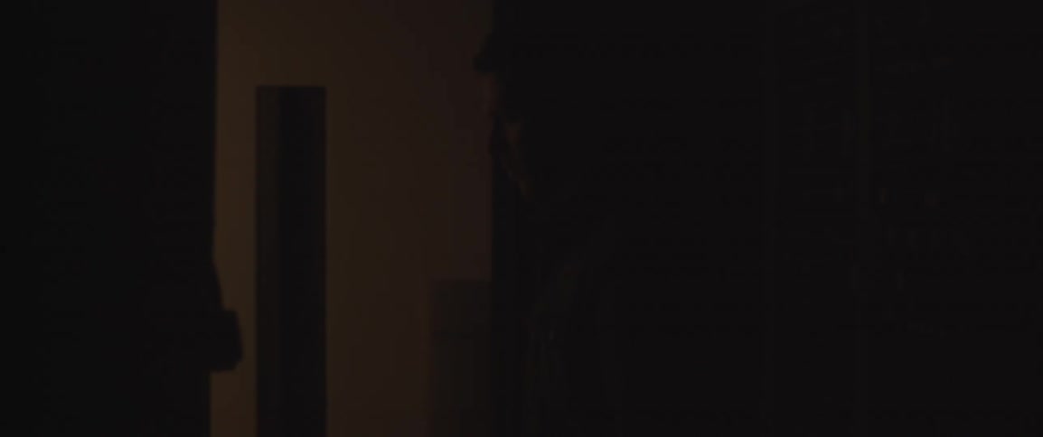 A man walks out of a home