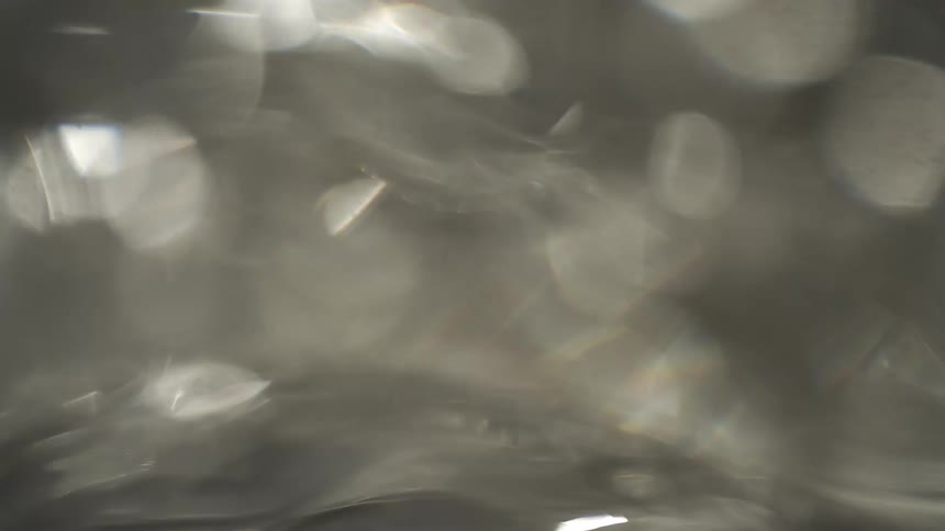 The boiling water bubbles and rises
