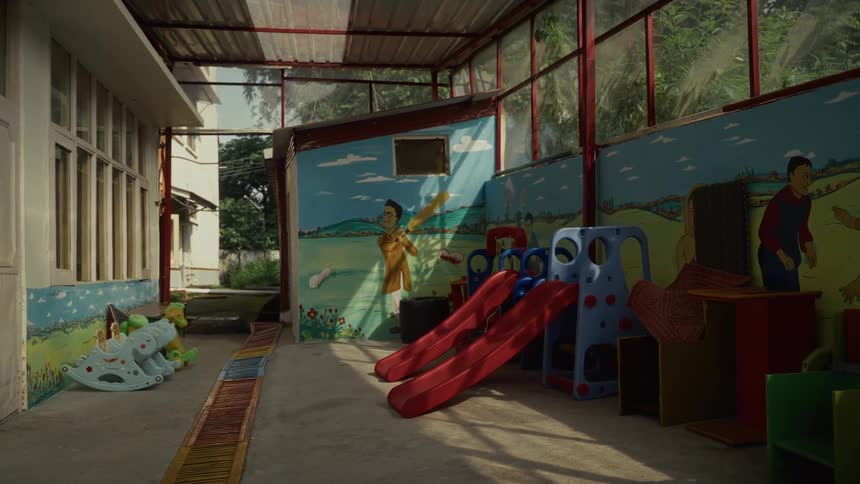 The play area inside is empty of people