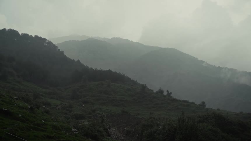 Mountain landscape covered in mist on a cloudy day