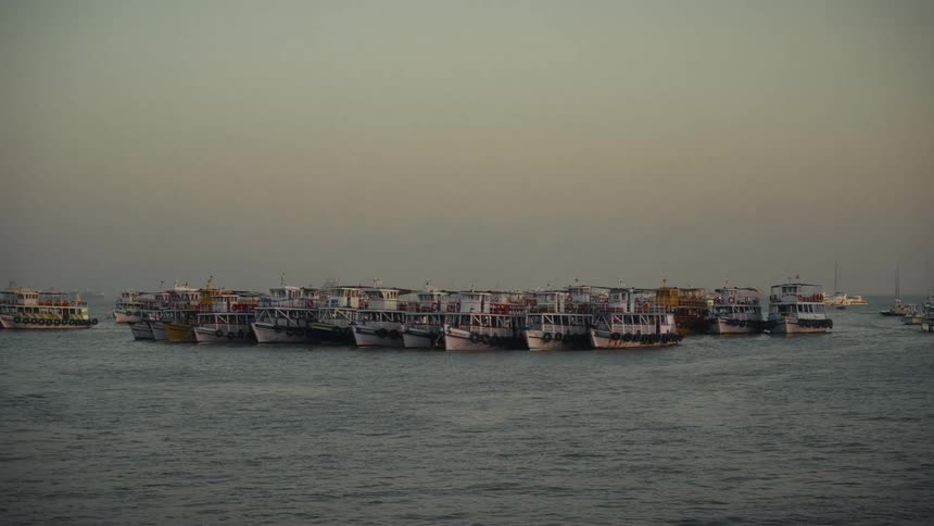 A group of boats out at a dock