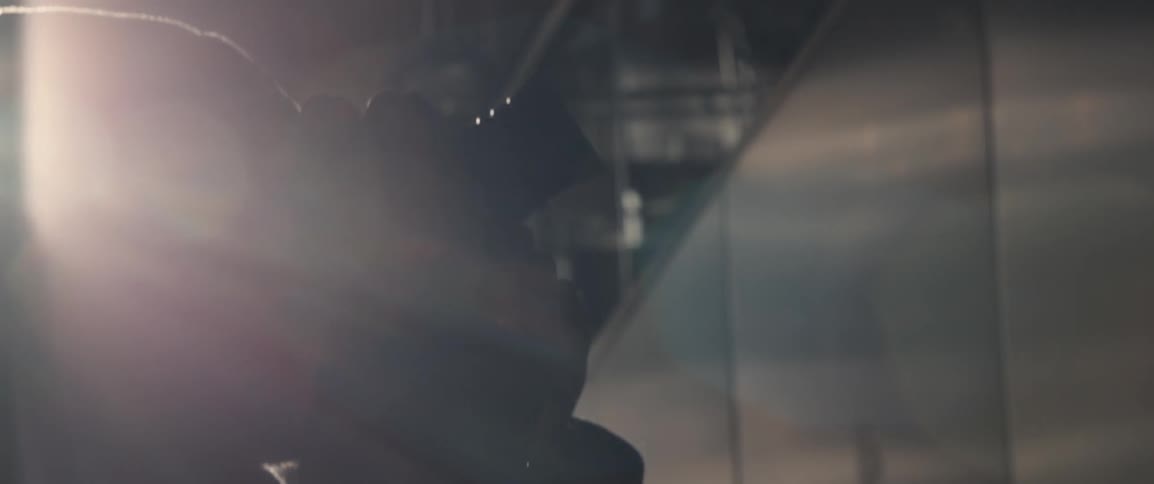 A man takes a photograph at night