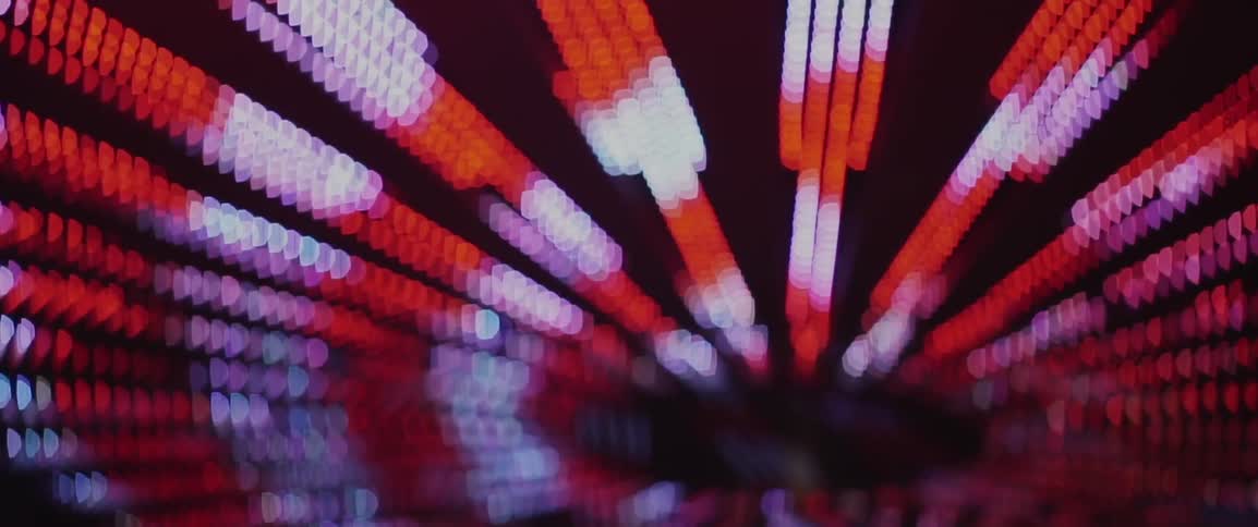Red and white lights on an amusement park ride