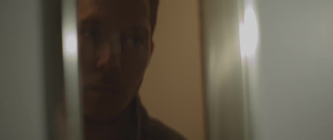 A man turns lights on and off repeatedly
