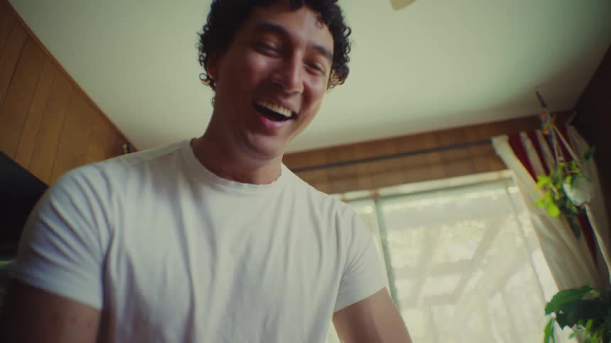 Man excitedly looking at something out of frame