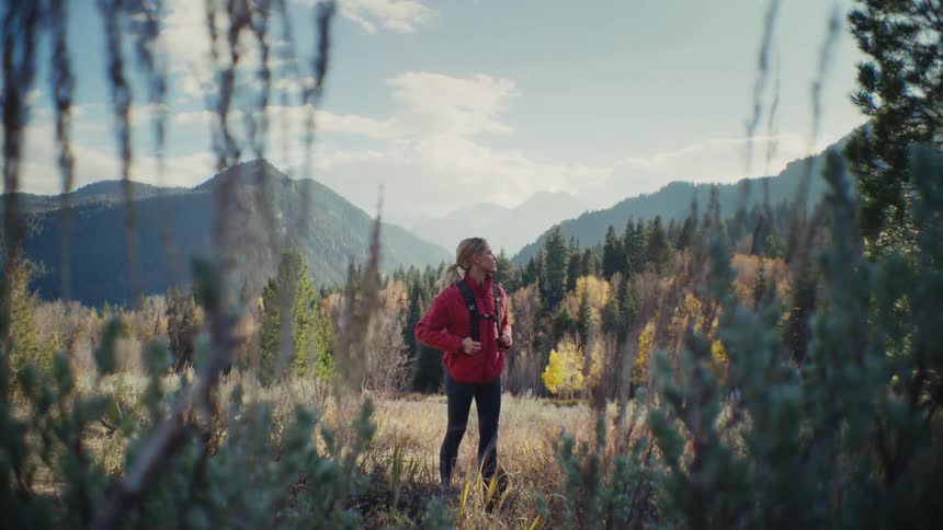 A woman walking outdoors