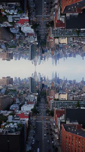 The cars drive through the mirrored city