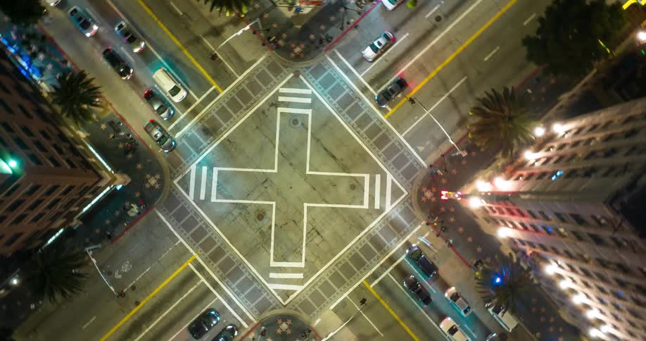 An aerial hyperlapse of the Hollywood Boulevard and Vine intersection at night