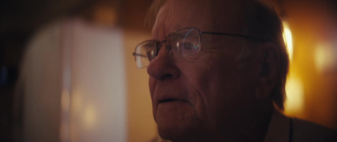 A portrait of a man looking at something in the distance