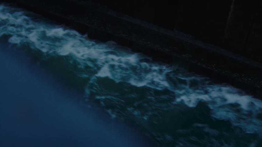 Waves lap against the side